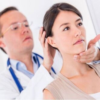 A neurologist examines a patient who has neck pain